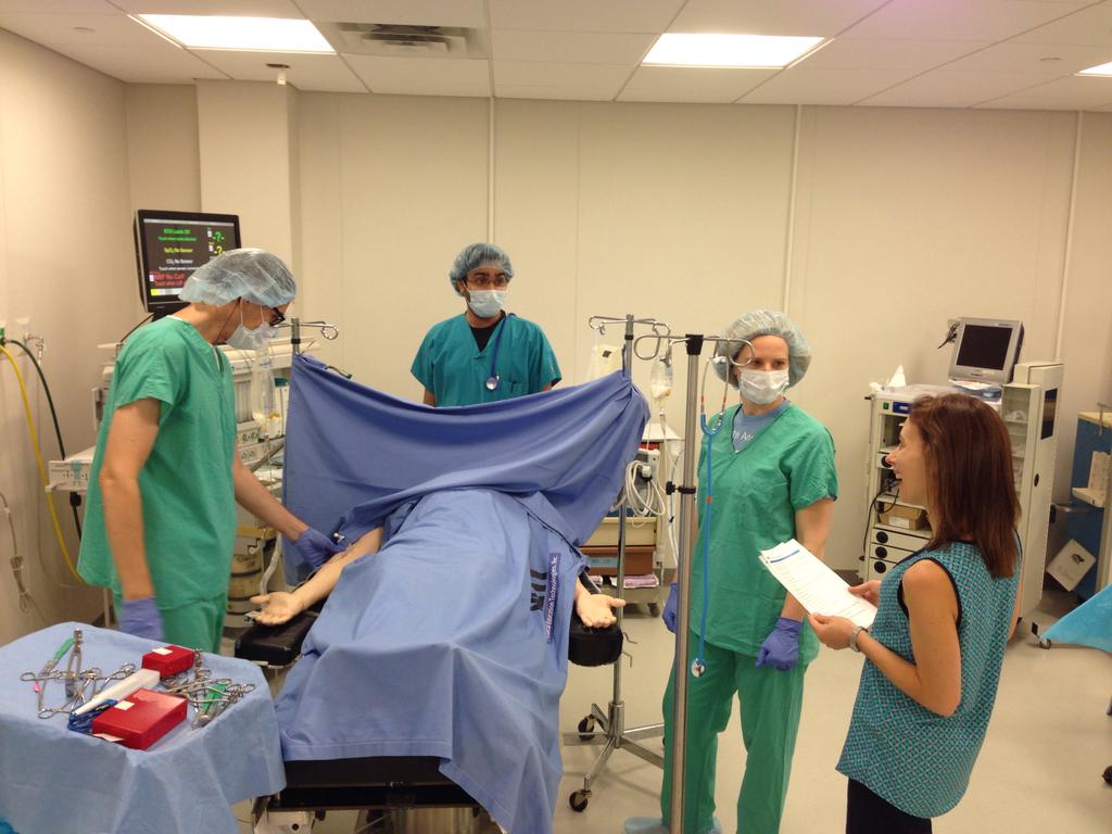 Photo of prebriefing for mixed modality simulation being used for anesthesia resident training